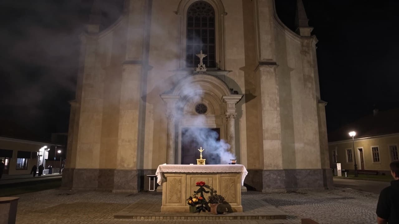 Damaged outdoor altar at night